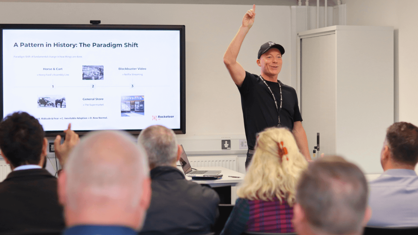 Richard Wood speaking on stage